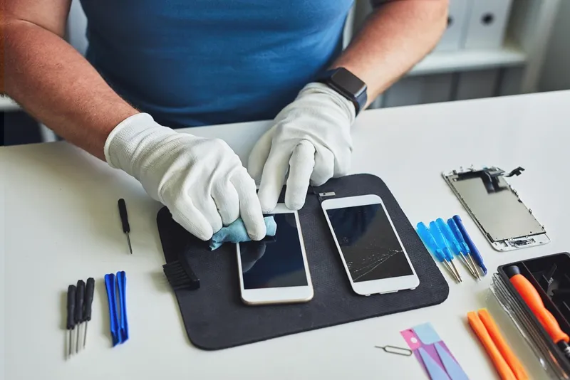 A smartphone with a badly cracked screen